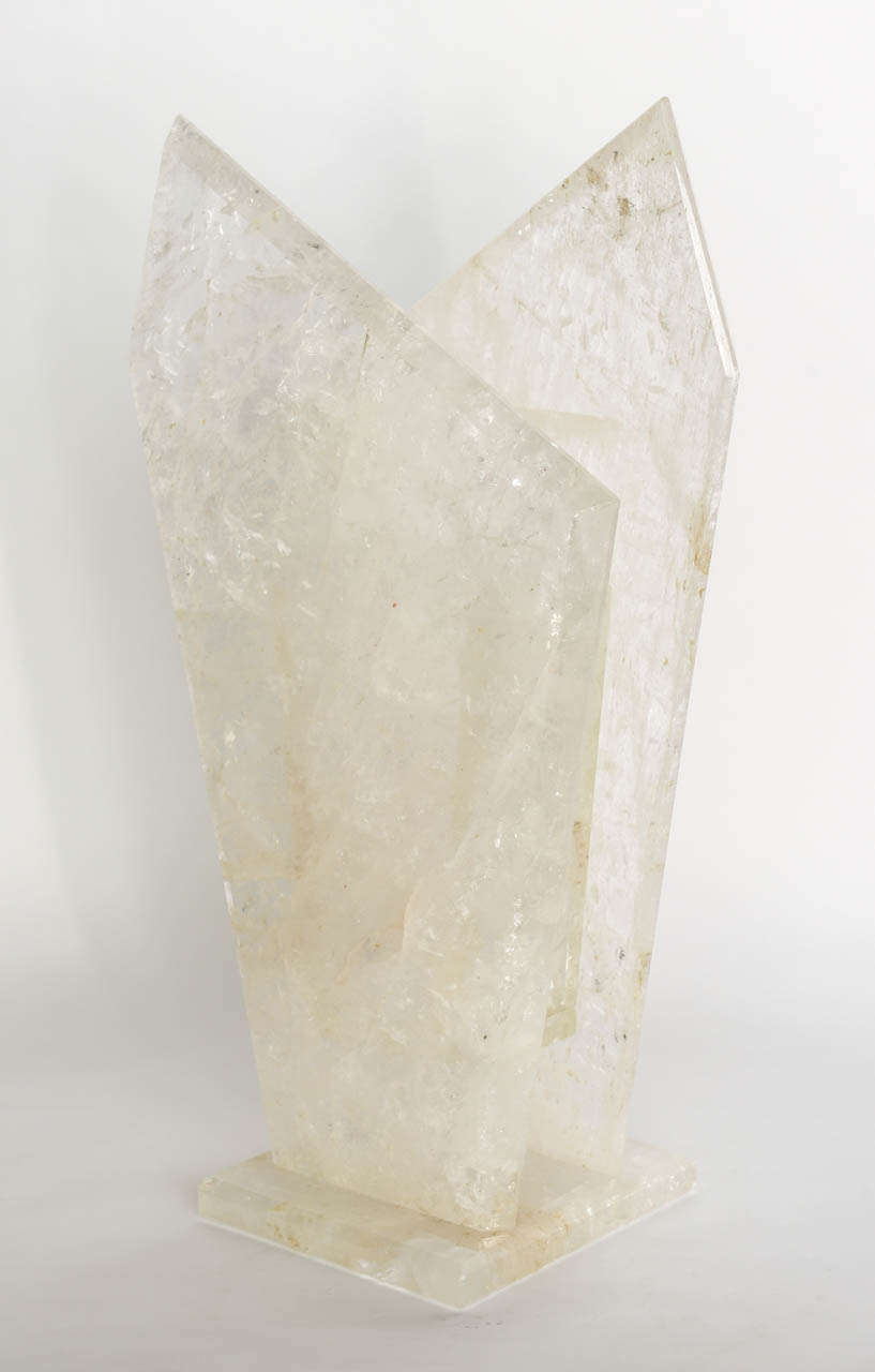 Each side with beveled slabs of rock crystal with triangular peaks on a square vase.