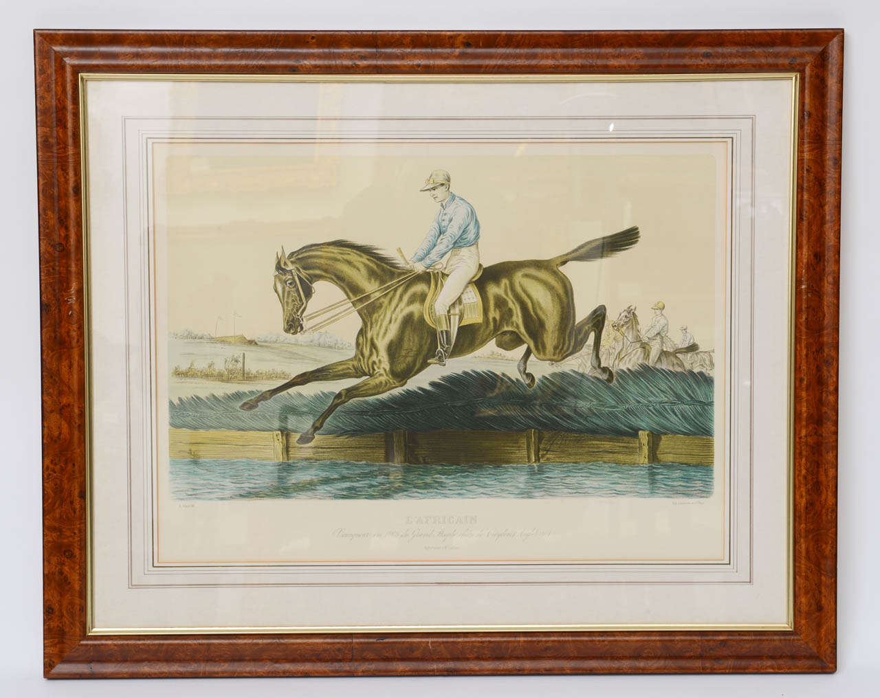 Set of FOUR Steeple Chase Equestrain Lithos, ( one not pictured ), in very good condition, no foxing.  Framed in burl walnut frames & French matted.