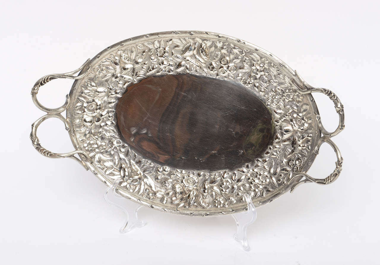 Sterling Silver Oval Bread Tray, with a wide ornate repousse floral border & twig handles; stamped 