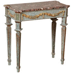 A Louis XVI Style Carved and Painted Marble Top Console Table