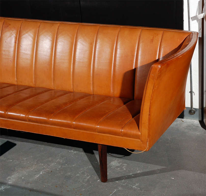 Leather sofa w/teak legs, manufactured by Peder Pederson