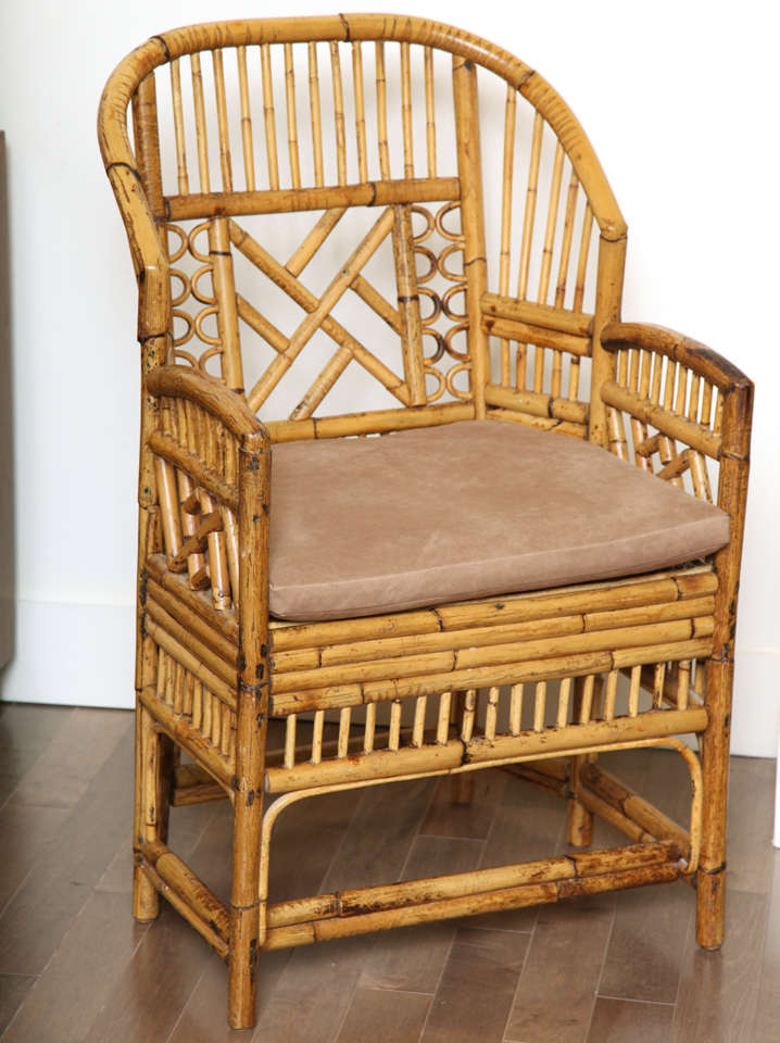 Pair of vintage rattan armchairs with upholstered seat cushion c. 1960