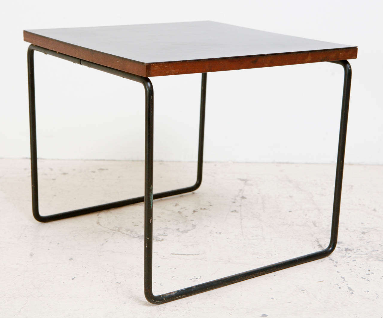 Mid-20th Century Pair of Black Laminate Tables by Pierre Guariche