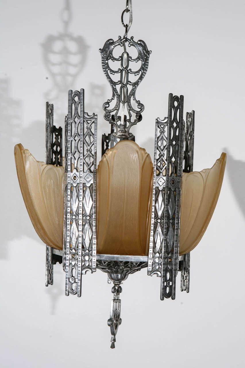 Art Deco chandelier with original slipper shades; newly wired for five candelabra bulbs.  Matching pair of sconces available.