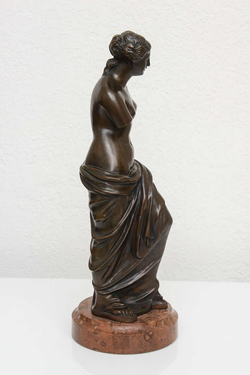 Grand Tour bronze Venus de Milo figure on a marble base.

Please feel free to contact us directly for a shipping quote or any additional information by clicking 