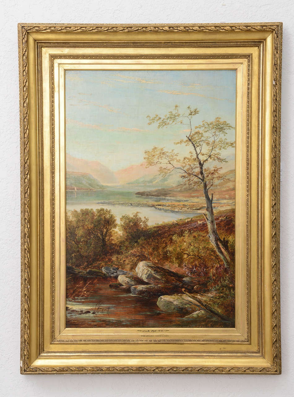 Scottish Highland landscape,  by 19th century British painter Thomas Hines, signed on lower right rock. Oil on board with a period gesso gilt over wood frame inscribed 
