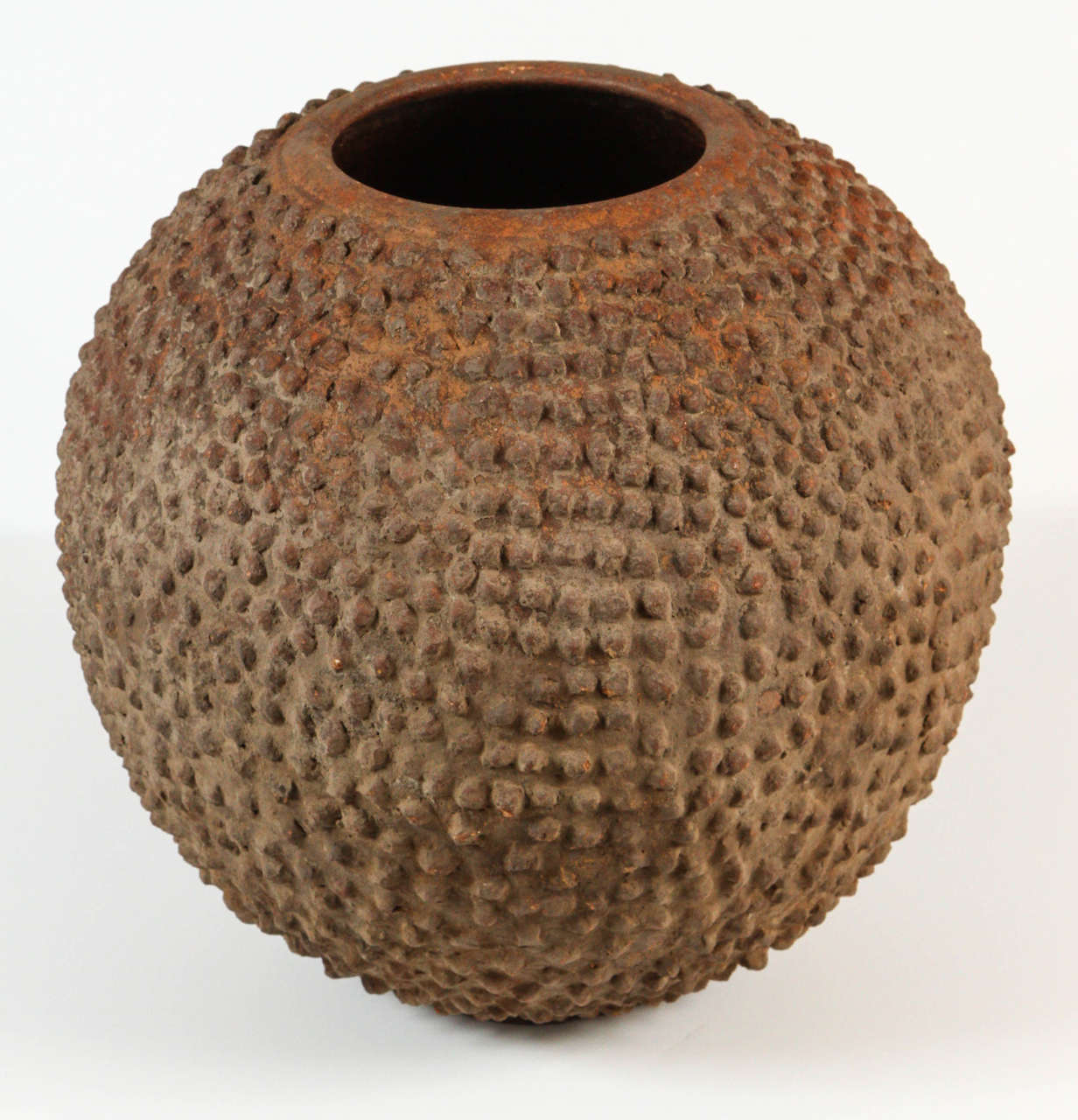 Volcanic clay Lobi pot with an arrangement of rounded points. This pot in excellent condition was executed about late 1970s-1990.

The Lobi are an ethnic group that originated in what is today Ghana. Starting around 1770 many of the Lobi migrated