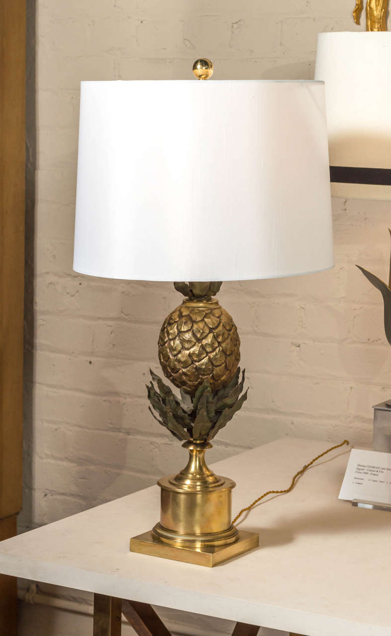 A gilt and patinated bronze lamp by Maison CHARLES, featuring a beautifully executed pineapple motif.
France - circa 1960