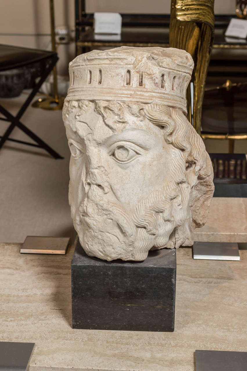 A Gothic style, cast-stone sculpture representing the had of a king with crown.
France - early twentieth century