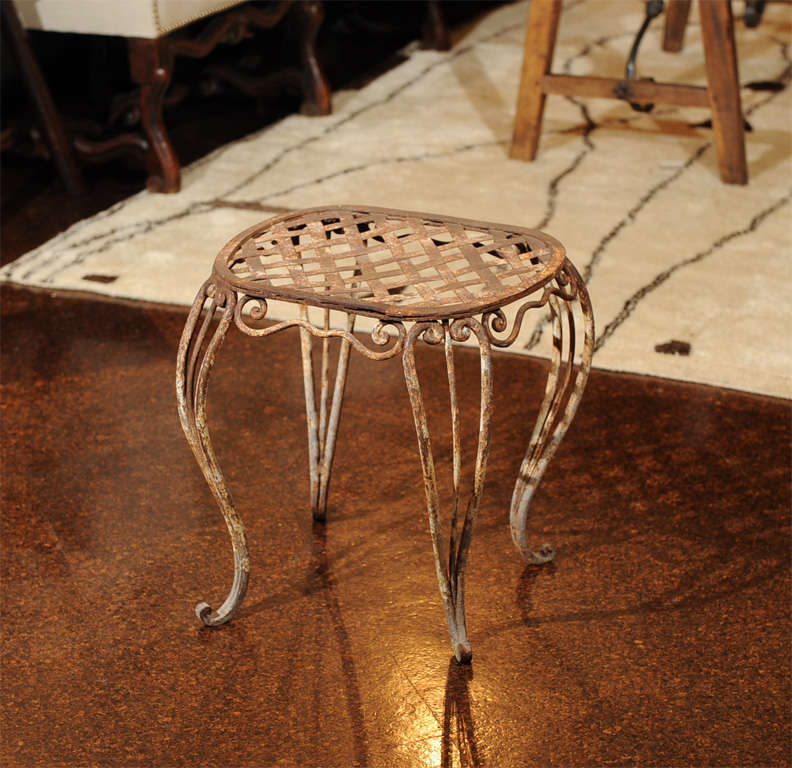 Pair of 19th century French iron garden stools, wonderful patina. Measures: 24