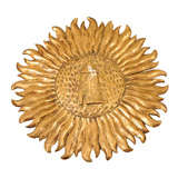 Carved Giltwood Sunburst with center relief