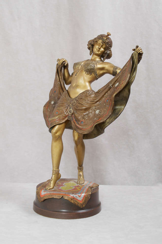 This highly detailed and lusciously cold painted Vienna bronze offers some of the best work of the great founder Franz Bergman.  The girl's dress lifts up and down for your amusement.  Don't be fooled by the very common smaller version of