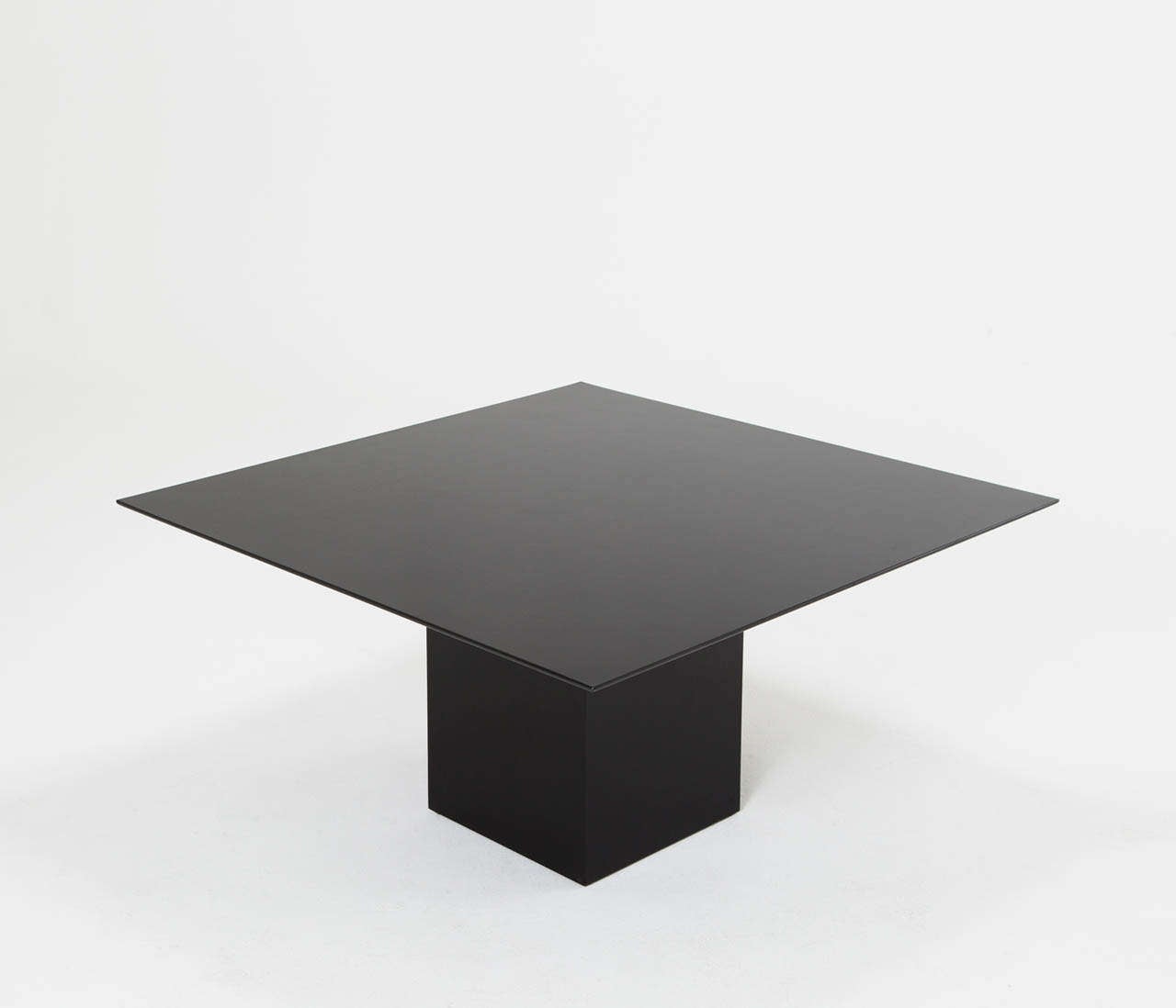 Black lacquered square table by Rosenthal Germany.

The table has a black lacquered surface and a thick pedestal base which gives this table a solid and sturdy look.