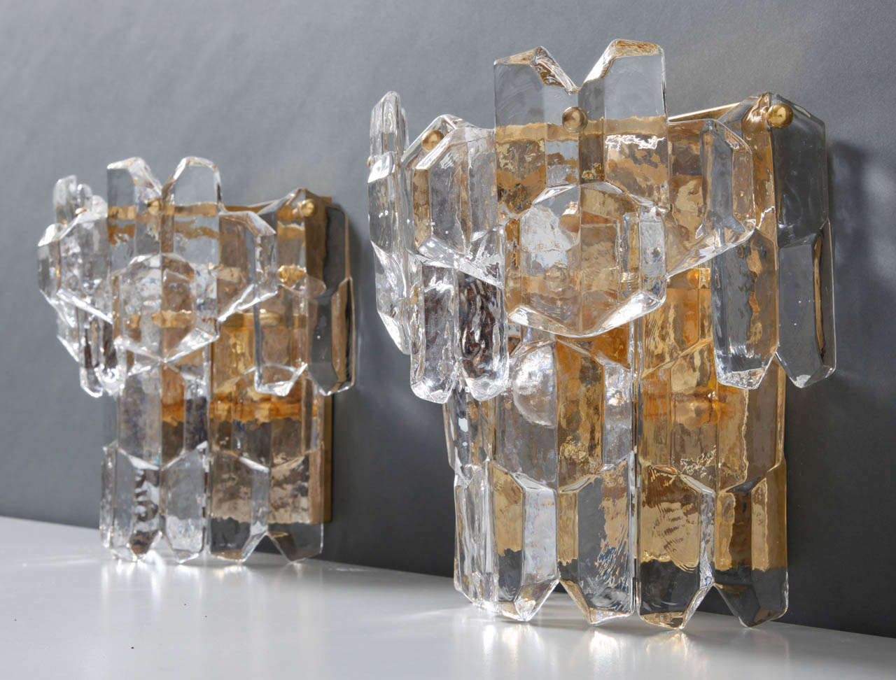 Mid-20th Century Large Kalmar Gilded Brass Textured Glass Sconces.