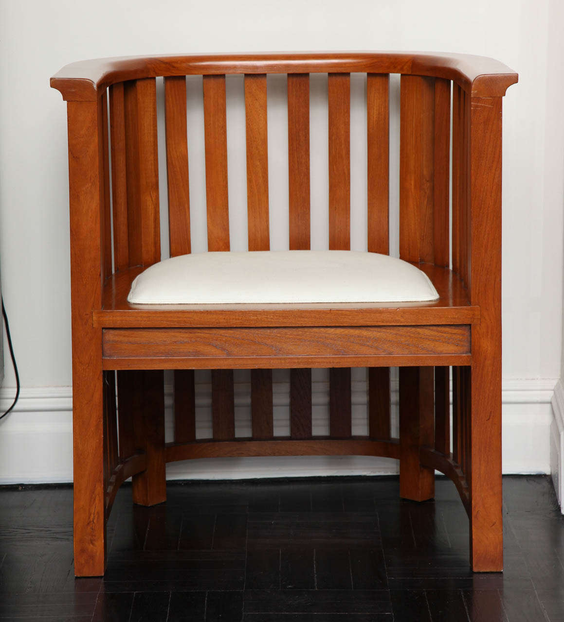 Pair of 20th century cherrywood slatted chairs, curved top rail, square legs.