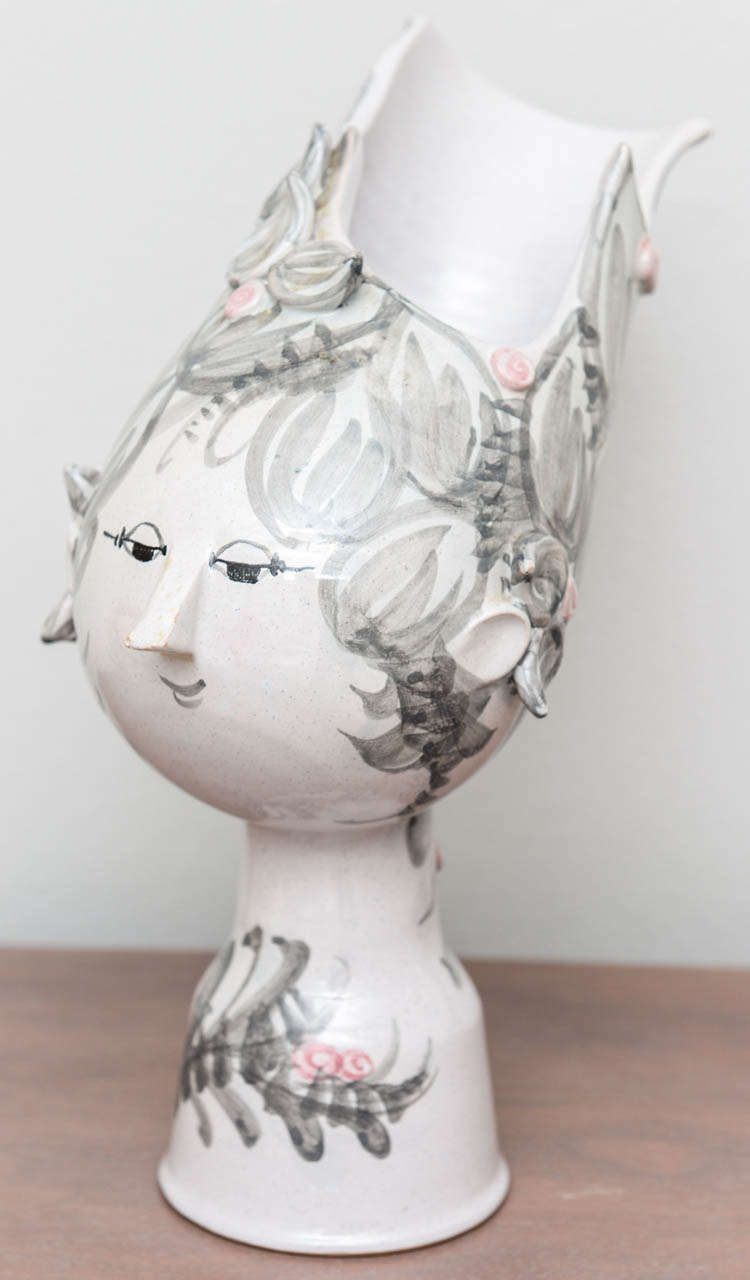 Enchanting hand-painted ceramic bust vase by Danish master Bjorn Winblad. A soft and unusually subdued color palette of pale grey, pink and white. Signed and dated.