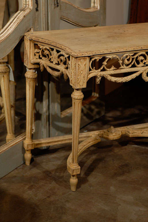 French carved and bleached console table with nice carving and stretcher.