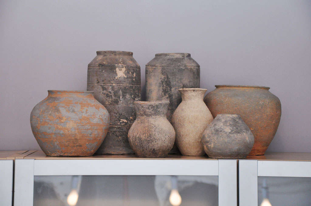 Collection includes 2 Han Dynasty granary pots, 2 Han Dynasty jars, 1 Warring States Pot, and 2 Neolithic cooking pots.
