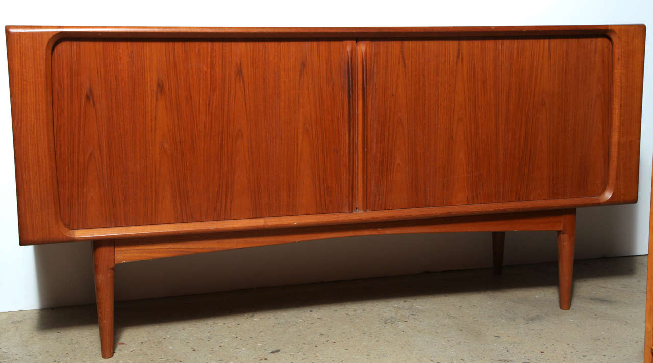 Teak Mid Century Sideboard or Hutch with 3 felt lined drawers, 3 adjustable shelves and 2 sliding tambour doors.  Perfect as Entertainment Cabinet or Dining Room Server