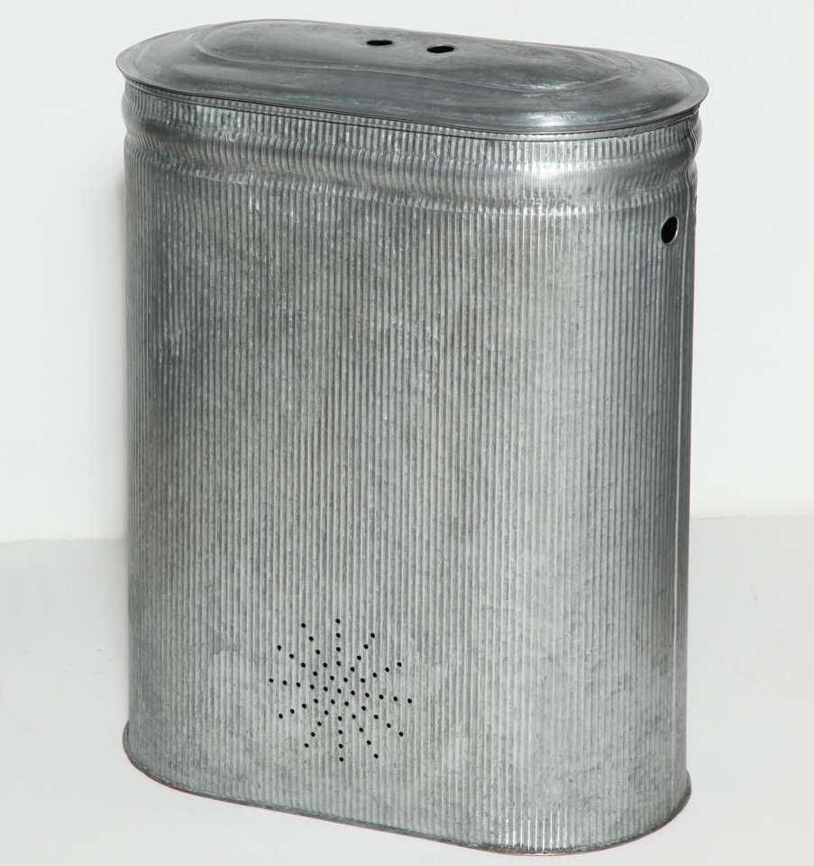 restored Steel Laundry Hamper Laundry with attractive decorative detailing.  