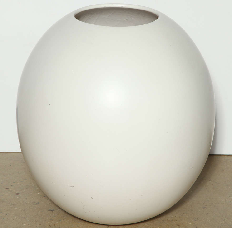 Substantial American Mid Century Off-White Stoneware Vessel.  Featuring a large egg shape, with satin glaze. 24.5H. (9.25D opening). Versatile. Architectural. Smooth. Statement vase. Plants. Branches. Suitable for indoor and outdoor use