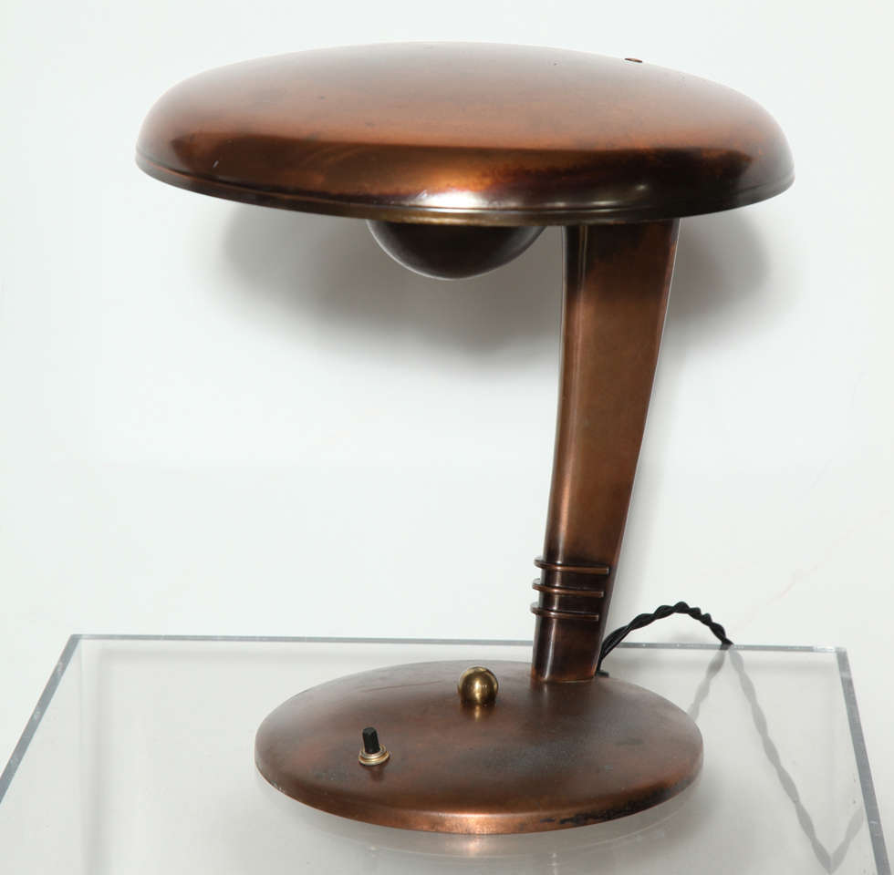 Classic 1930's Modern, Industrial, Streamline designed Lamp in Copper plated Brass, sits on 8