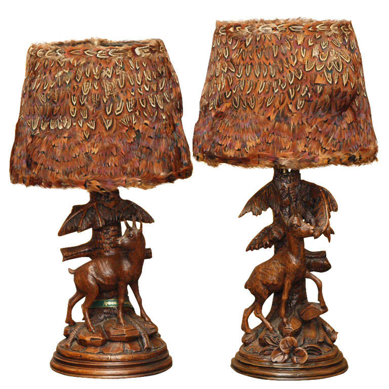 Pair of Black Forest lamps with feather shades. For Sale