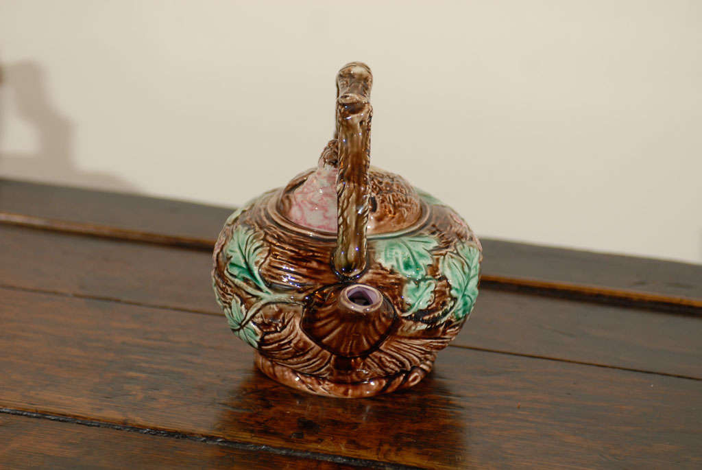 Glazed English Majolica Tea Pot with a Bird in Nest Theme
