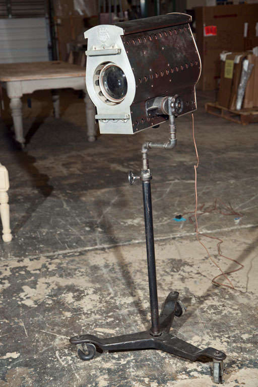 Vintage movie studio standing light on a rolling tripod base, stamped Murray, c. 1930. Diameter dimension of 24