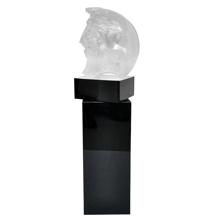 Acrylic sculpture of Moonscape II - Aria by Michael Wilkinson, rotating black gloss acrylic pedestal in the shape of a square column with lighted rotating display.    

Signed, numbered and dated on bottom of sculpture.    MW 180-500       1999