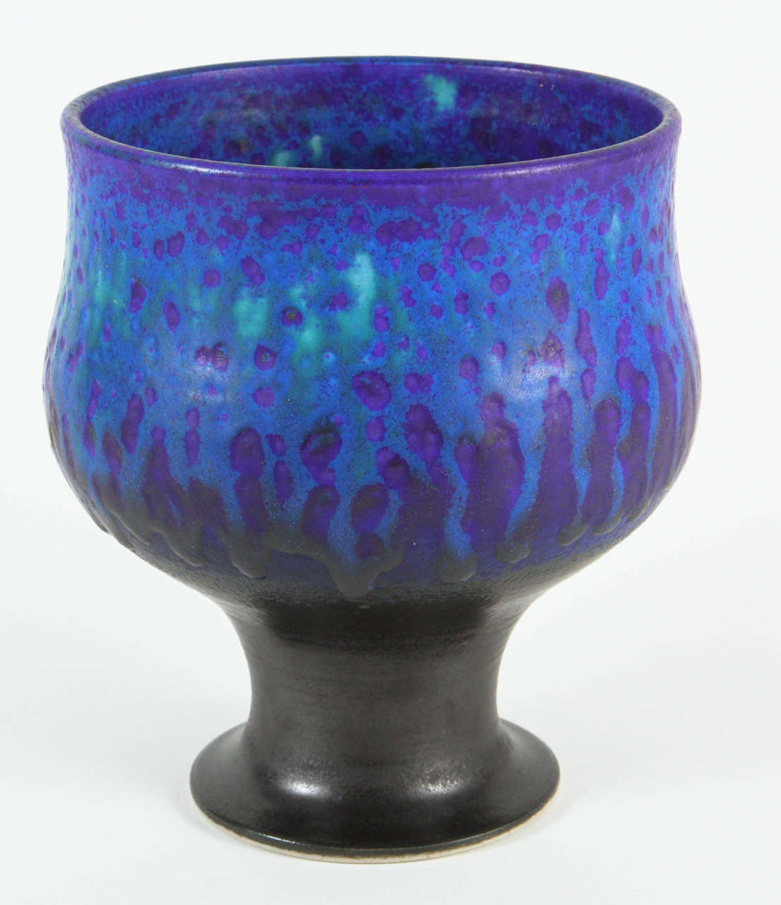 An oversized chalice form vase from the art studios of Arabia, the preeminent ceramic firm of Finland. The colors are accurately represented. Mint condition.