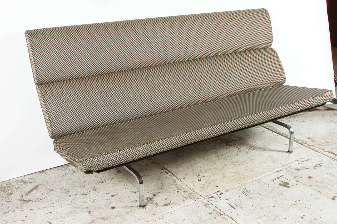 Eames compact sofa with original Alexander Girard checkered upholstery.