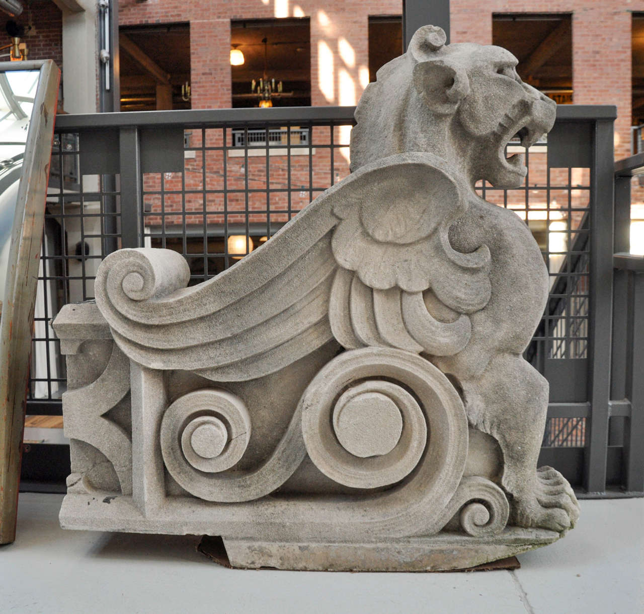 The best of the best pair of large winged limestone griffins from a bank in Kansas City, circa 1920.