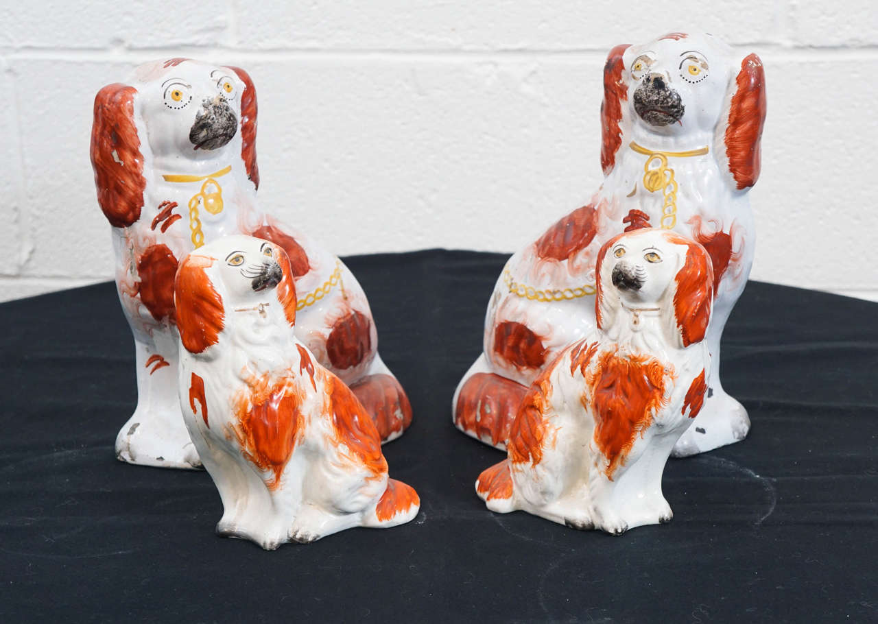 Here is a charming group of Staffordshire dogs ( Spaniels )
The large pair is available for $800. and the small pair $450.