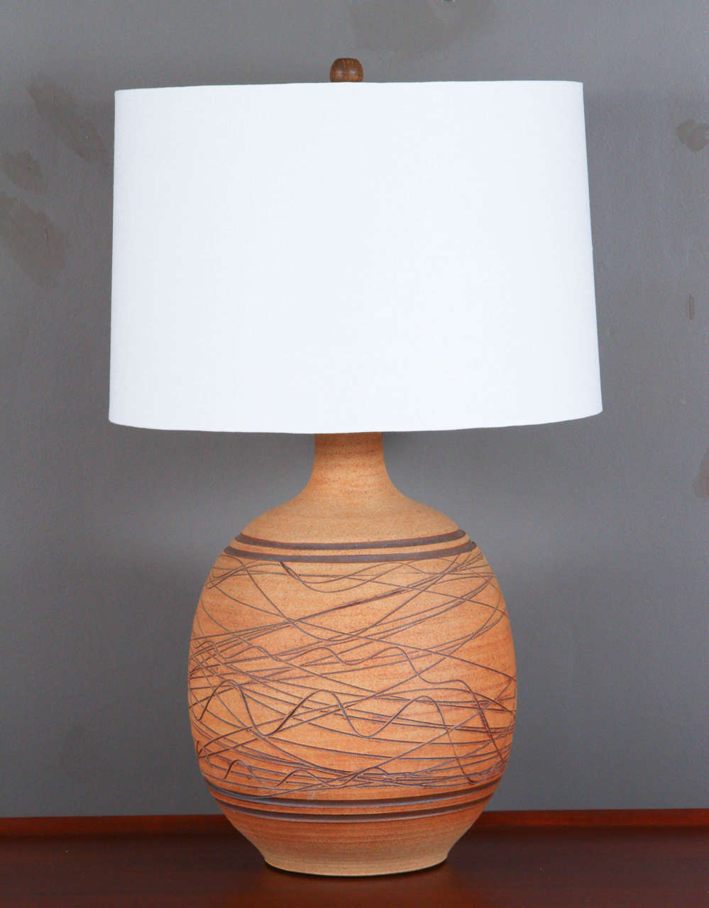 Incised bisque ceramic lamp by design duo Wishon-Harrell.