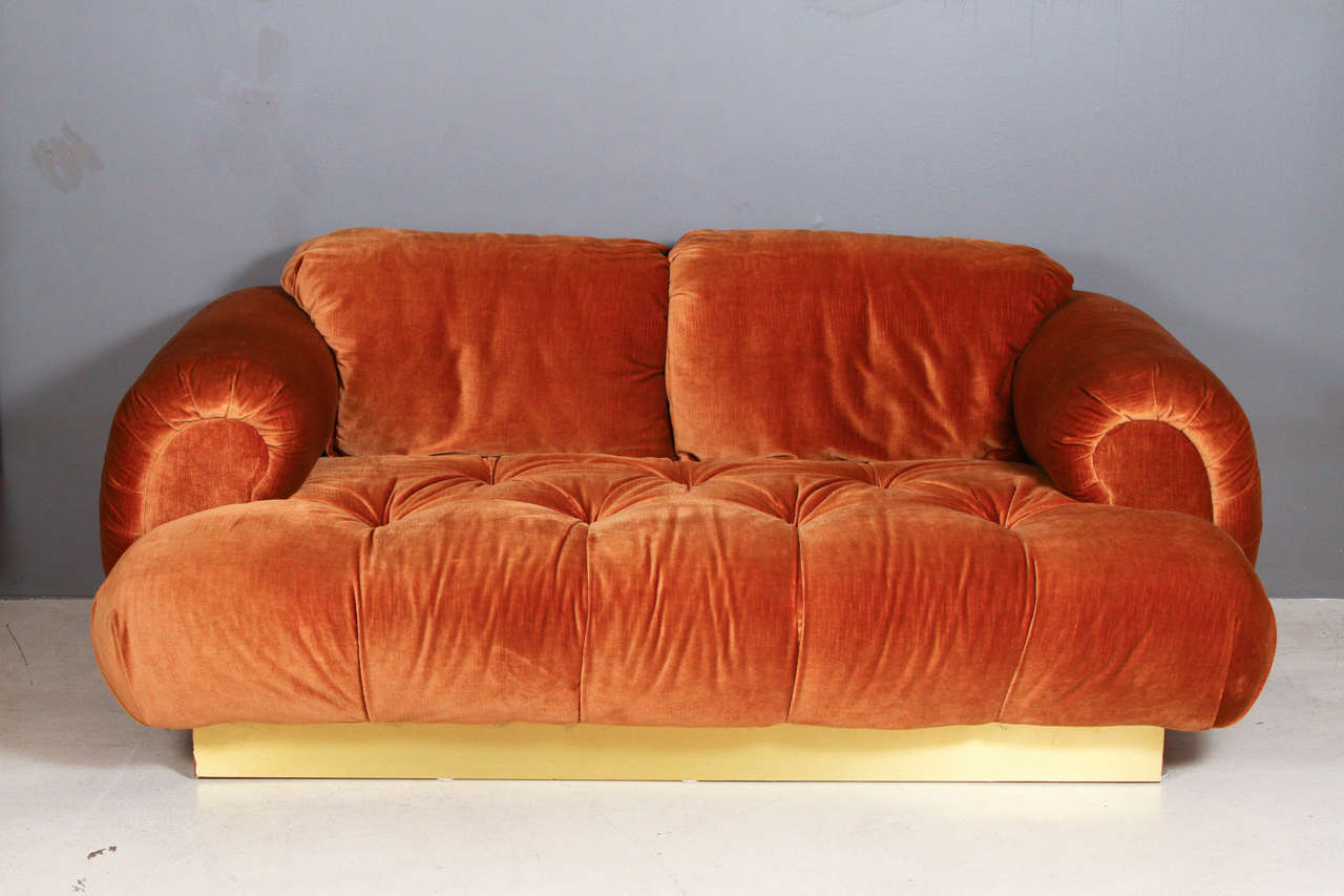 Loveseat by Milo Baughman for Directional in original copper-colored aged velvet with a brass base. Larger, sofa-sized version also available.