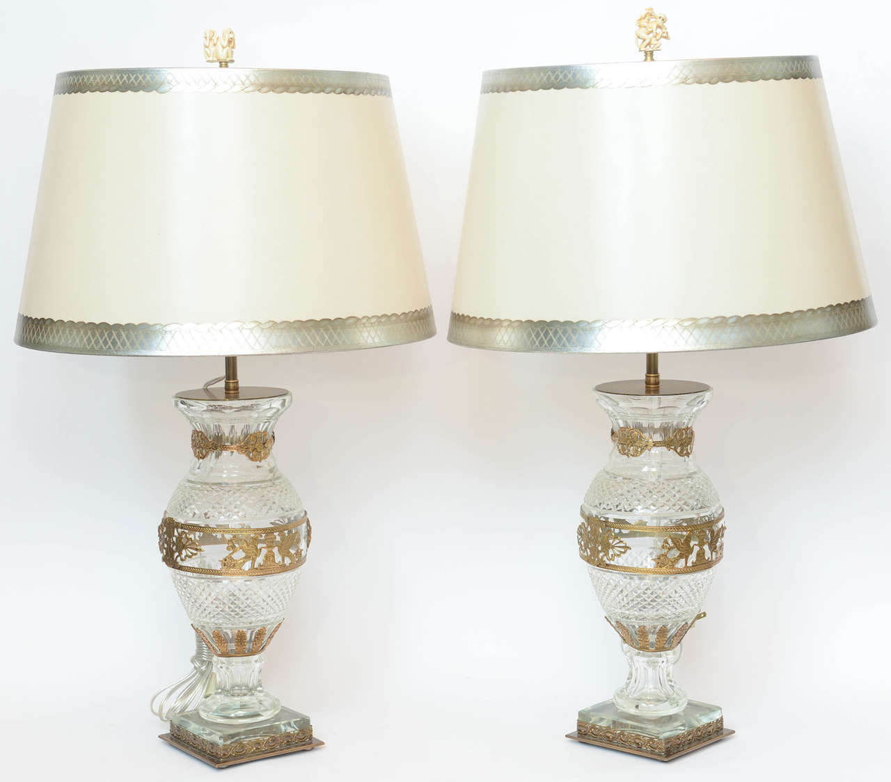 A pair of Baccarat crystal bronze-mounted vases, stamped Baccarat, circa first half of the 20th century.