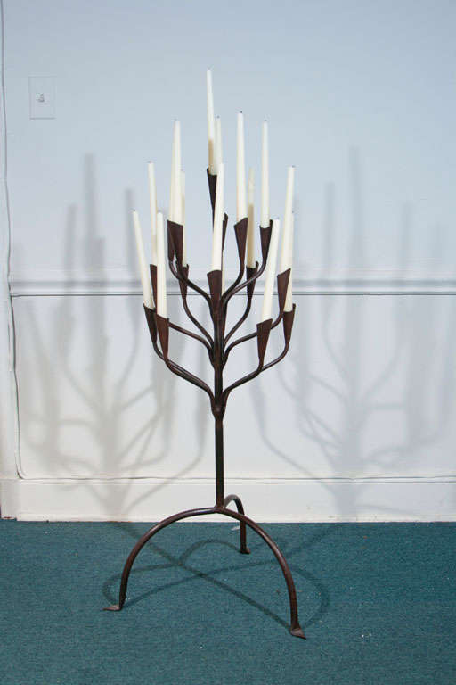 HAND MADE BY ARTIST JOHN SILVERCLOUD IN TAOS, N.M. THIS IS A 16 CANDLEHOLDING STAND MADE OF HAND FORGED IRON. PAINTED BLACK.  THE 9