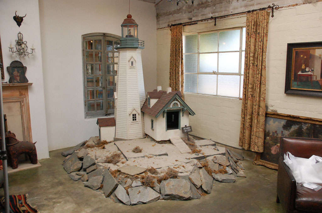 Large architectural scale model of an East Coast style lighthouse. Handmade as a humorous concept for an indoor dog house. Has revolving electric beacon light.