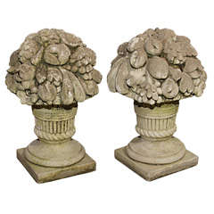 pair of stone garden topiaries