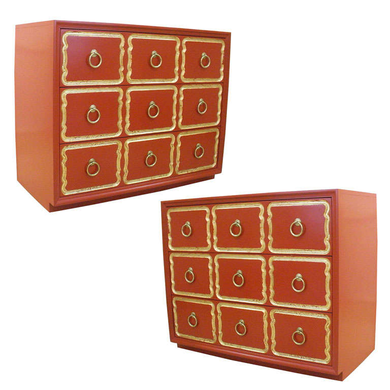 Pair of orange Dorothy Draper Espana chests of drawers.
