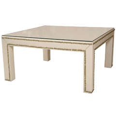Parsons Coffee Table Covered in Faux Python with Nail Head Detail