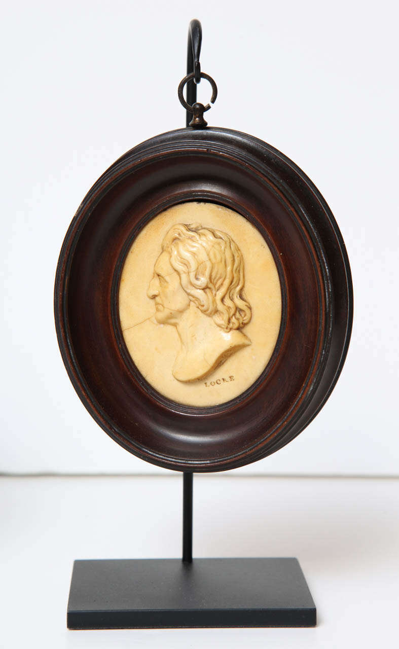 A Pair of 19th Century English Wax Portrait Medallions 1
