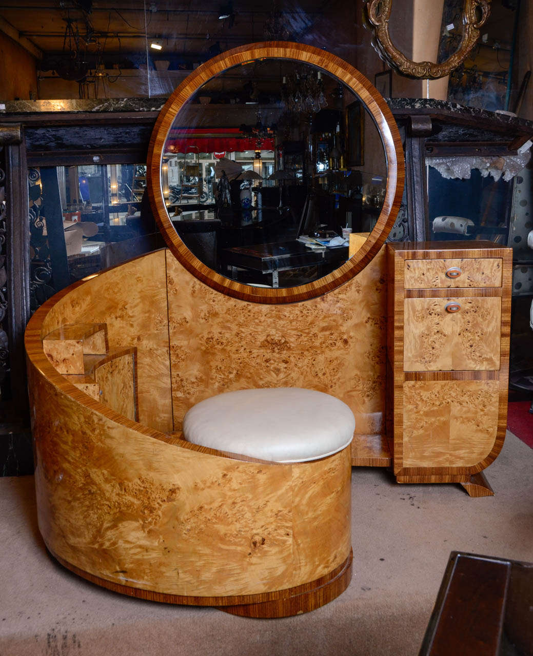 Rare Art Deco vanity in bird's eye maple. Embedded stool and bevelled mirror.