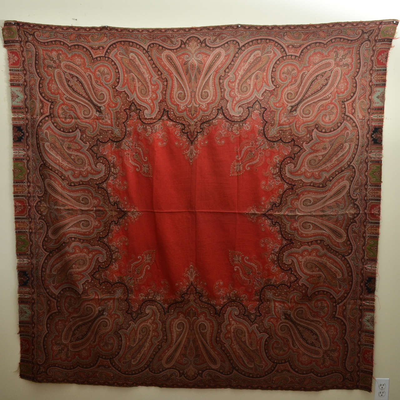 Mid-19th century square Paisley shawl with scarlet red center, surrounded by 