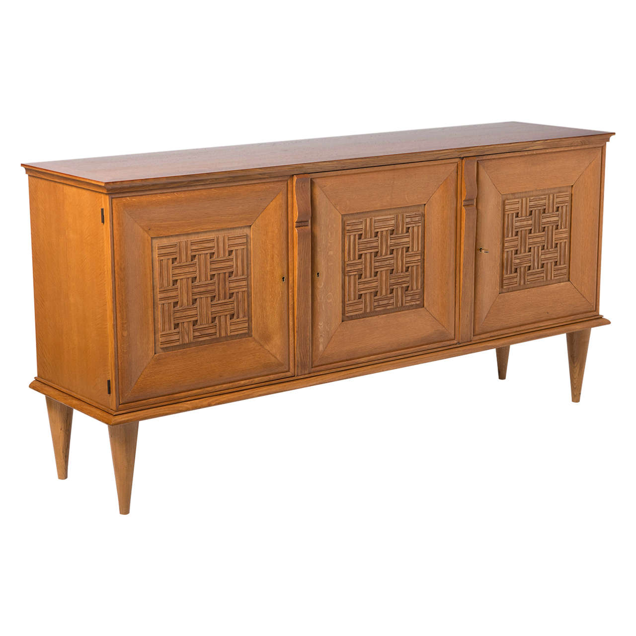 Oak side cabinet with carved panels, France circa 1940 For Sale