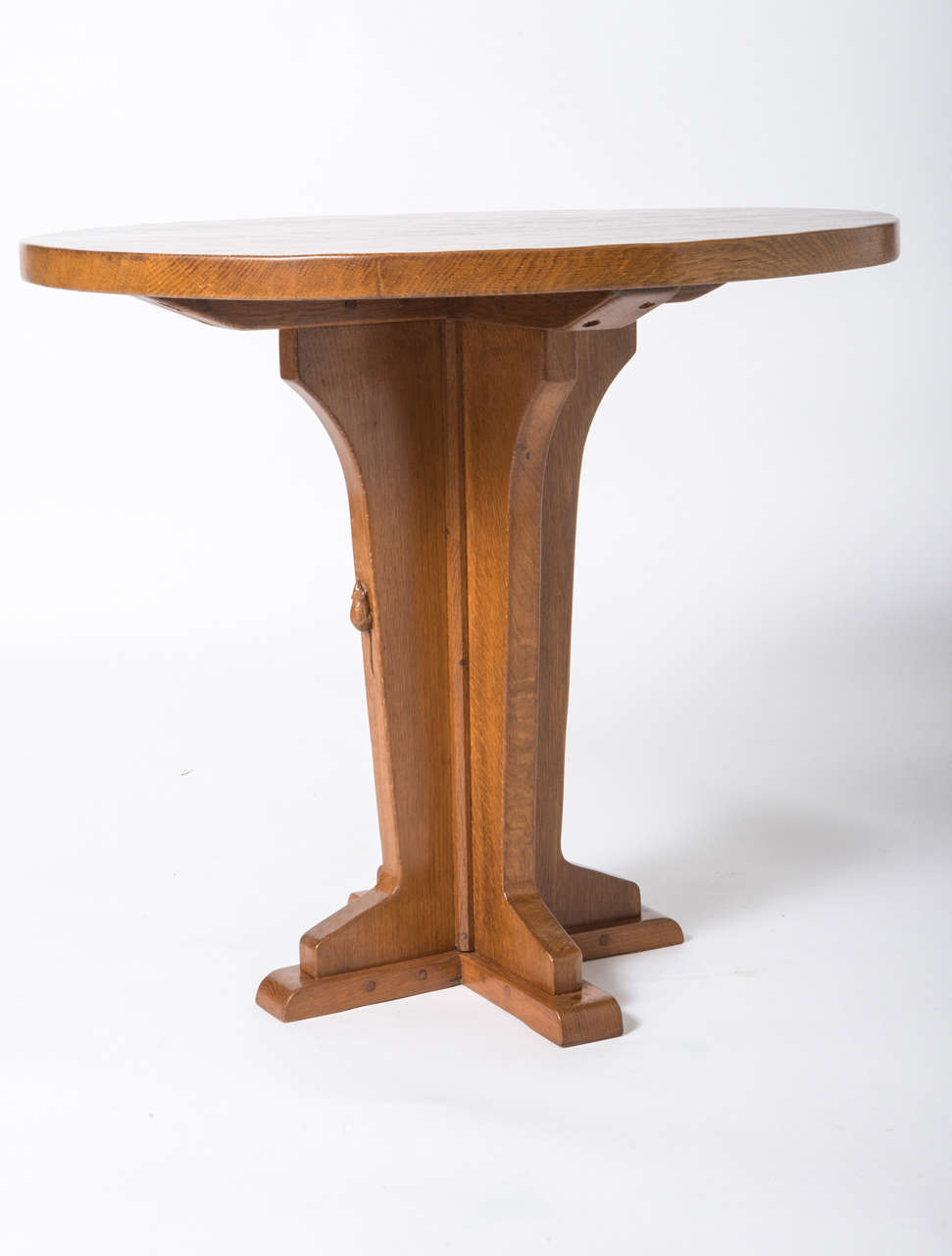 Oak Robert “Mouseman” Thompson round oak side table, England circa 1960