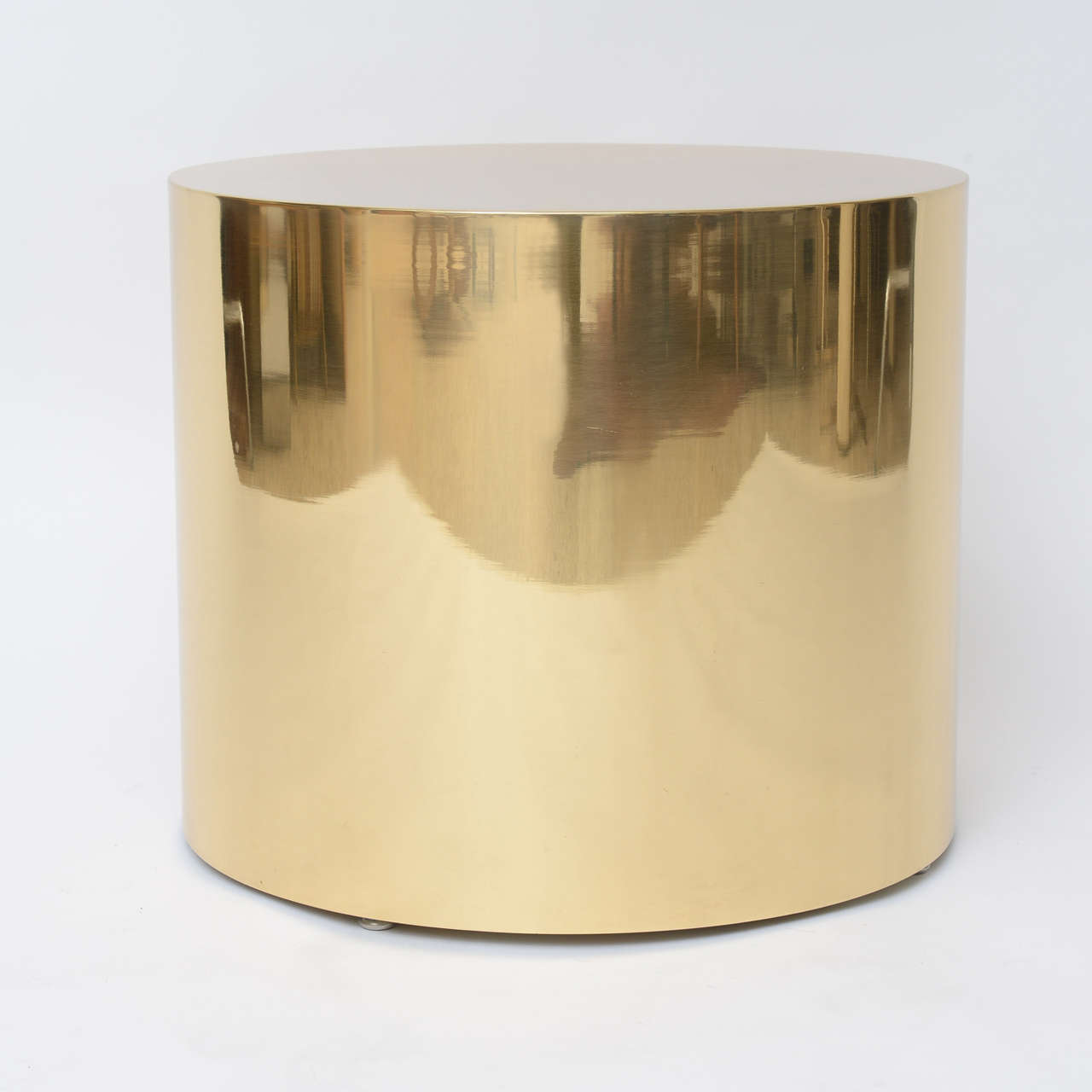 Pair of Polished Bronze Drum Tables 1