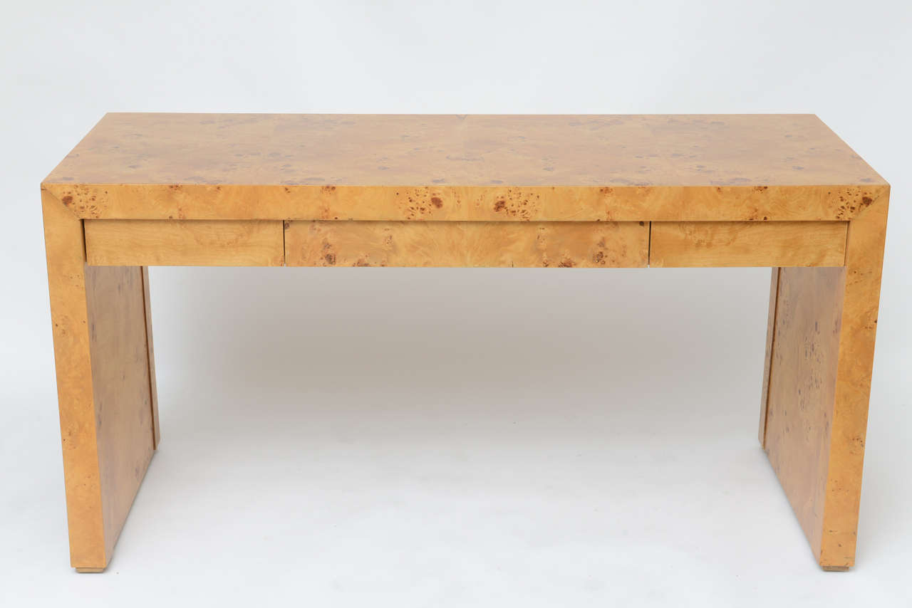 Handsome Minimalist Parsons style desk in olive burl wood with three drawers. Could serve as a generous console as well.