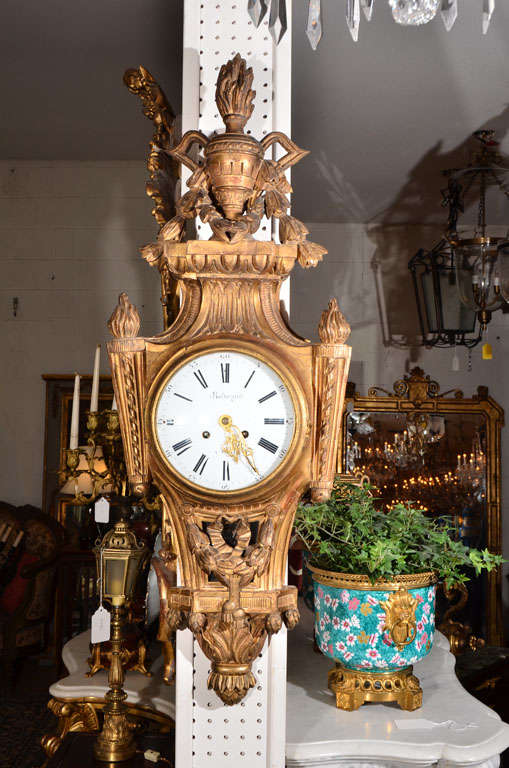 wood carved gold leaf wall clock, stamped Paris on clock face